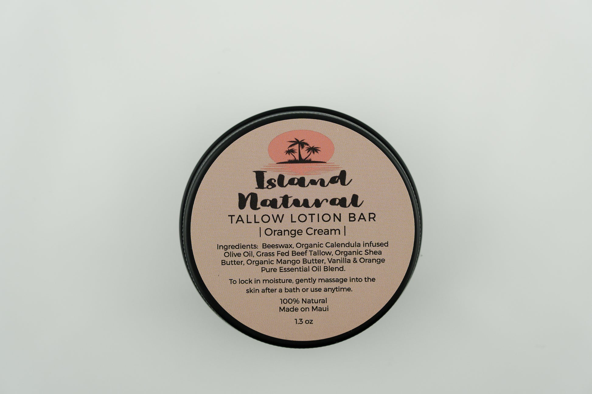 Island Natural Skincare Tallow Lotion Bar on a light gray background