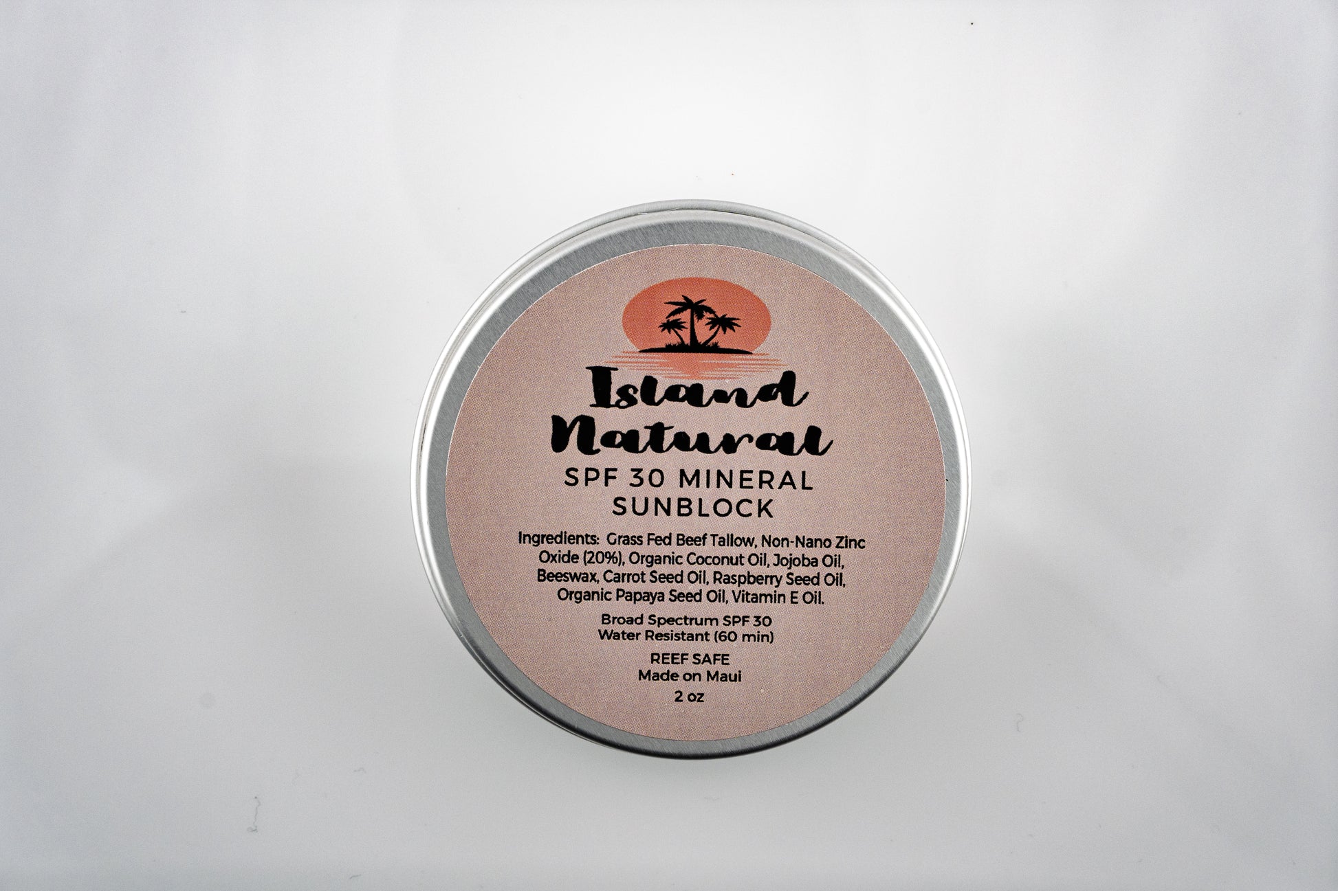 Island Natural Skincare SPF 30 mineral sunblock tin on a white background